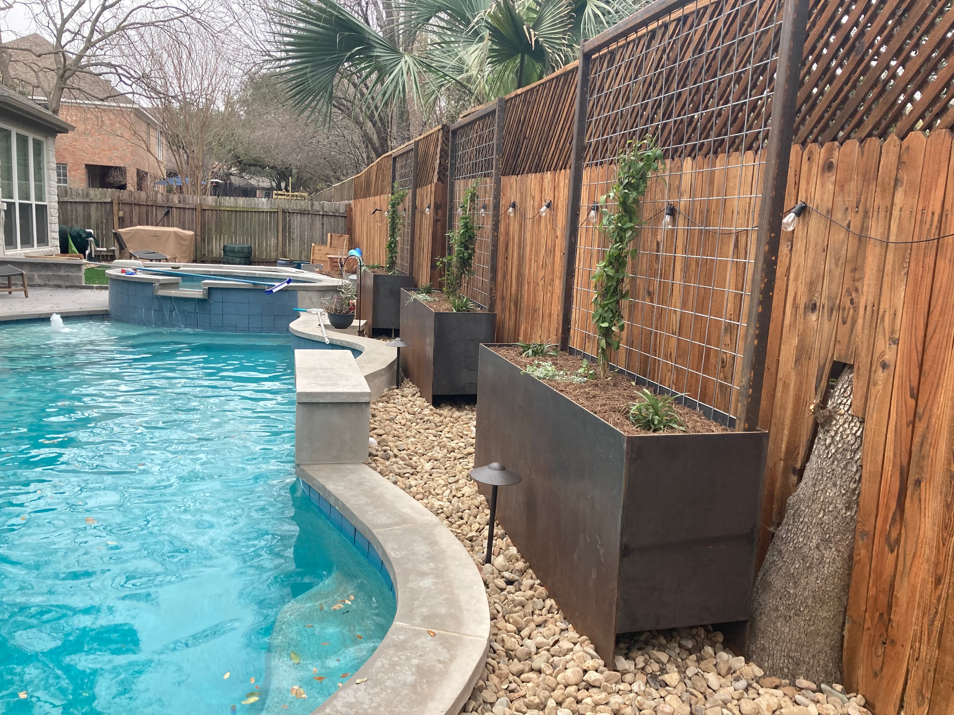Steel planters with trellises Austin TX